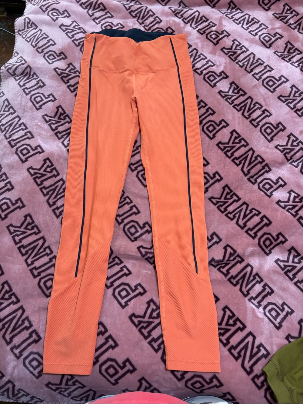 High-Rise Orange Leggings with Black Waistband and Side Stripe